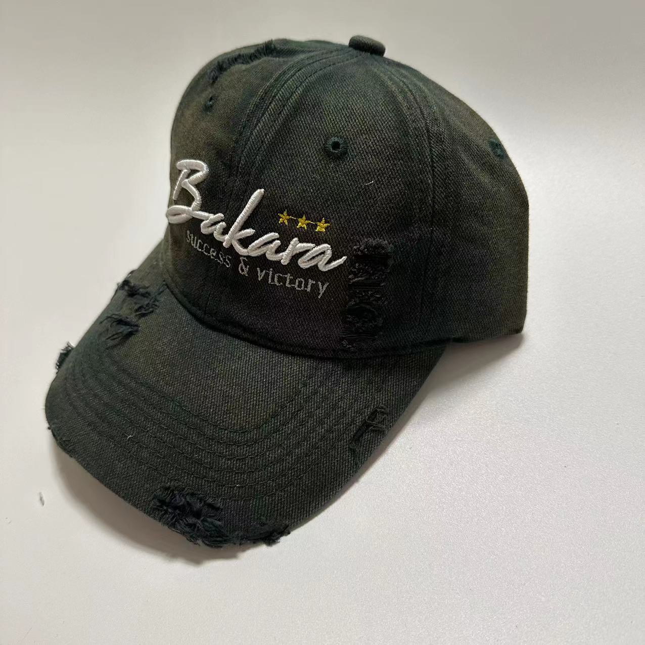 BAKARA Torn Caps