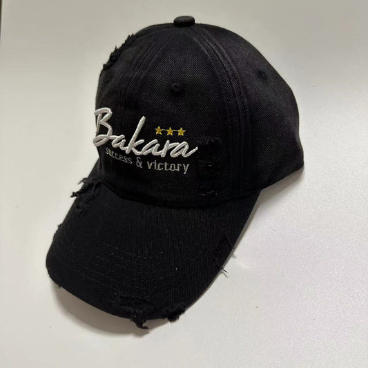 BAKARA Torn Caps